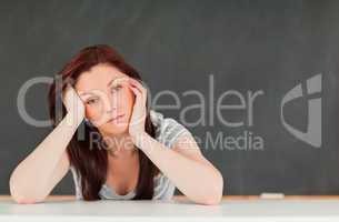 Tired student in a classroom