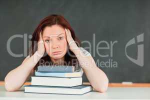 Tired young student in a classroom