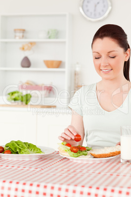 Cute woman ready to eat a sandwich for lunch