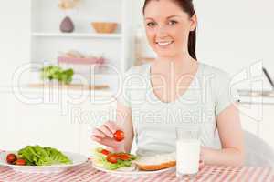 Attractive woman ready to eat a sandwich for lunch
