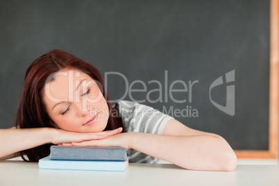 Young female student sleeping