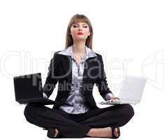 Yong business woman in yoga with two laptop