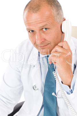 Mature doctor male on phone professional look