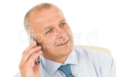Smiling businessman on phone close-up portrait