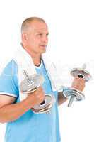 Happy mature man working out with dumbbells