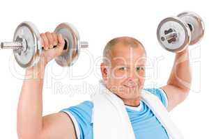 Happy mature man working out with dumbbells