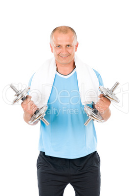 Happy mature man working out with dumbbells