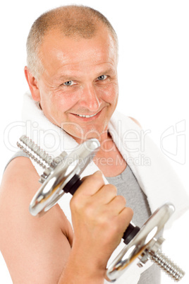 Happy mature man working out with dumbbells