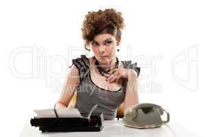 Businesswoman taking telephone call in office