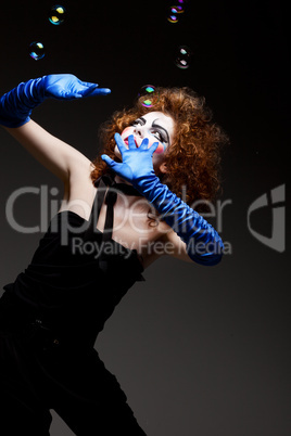 woman mime with soap bubbles.