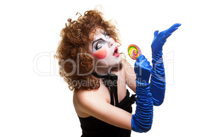 woman mime with theatrical makeup singing