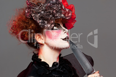 woman mime with knife