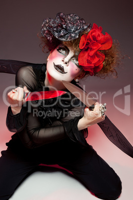 woman mime with knife