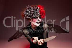 woman mime with knife