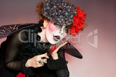 woman mime with knife