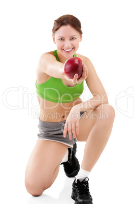 woman in sportswear with apple