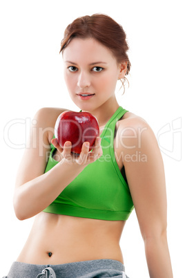 woman in sportswear with apple