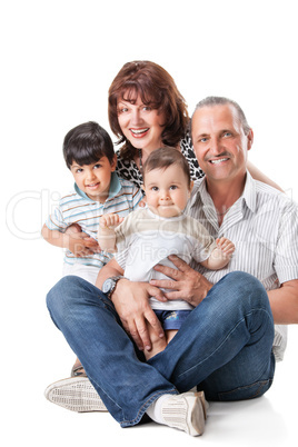 Happy grandparents with two handsome grandsons