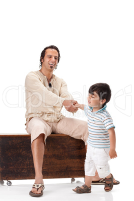 Father and little son studio portrait