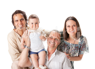 Studio Shot Of Family Group Sitting In Studio