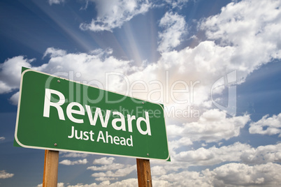 Reward Green Road Sign Against Clouds