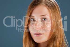 Portrait of red-haired young woman