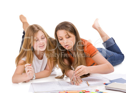 two young happy student girl, isolated on white