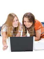 two young happy student girl work on laptop