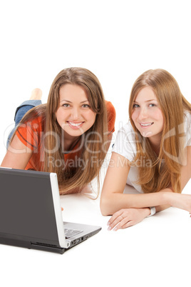 two young happy student girl work on laptop