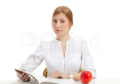 woman with apple and book