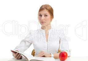 woman with apple and book