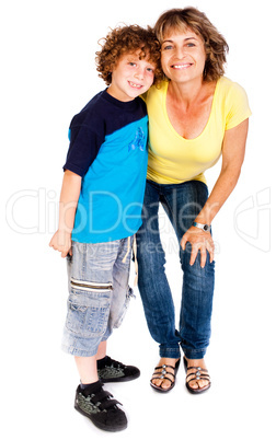 Grandmother and grandson hugging each other