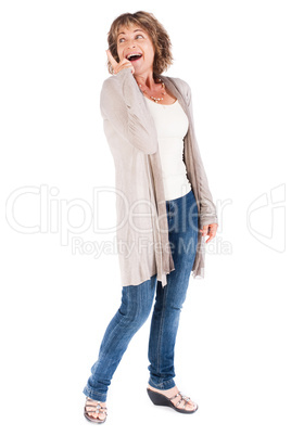 Senior woman pointing upwards and looking away