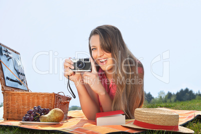 young woman making a picture