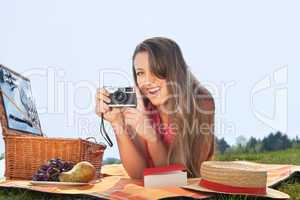 young woman making a picture