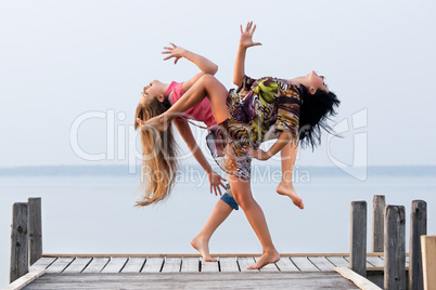 two girl  are dancing