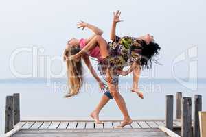 two girl  are dancing
