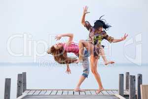 two girl  are dancing