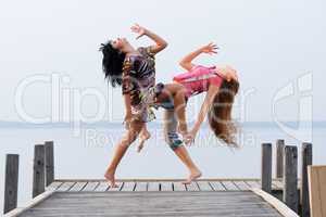 two girl  are dancing