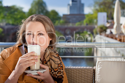 attractive young woman relaxing in cafe