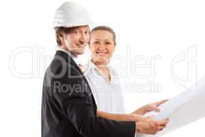 An architect wearing a hard hat and co-worker
