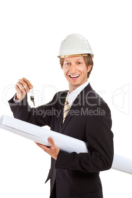 smiling engineer giving keys from apartment