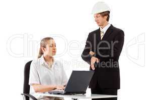 Two businesspeople working with laptop