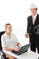 Two businesspeople working with laptop