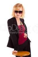 woman with sunglass posing on white