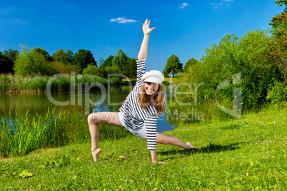 young woman exercising outdoor in summer