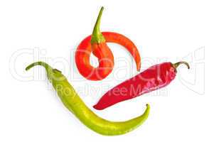 Three colorful hot peppers