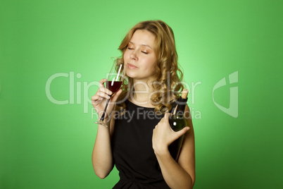Close-up of woman with glass red wine