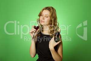 Close-up of woman with glass red wine