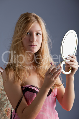 beautiful woman with mirror